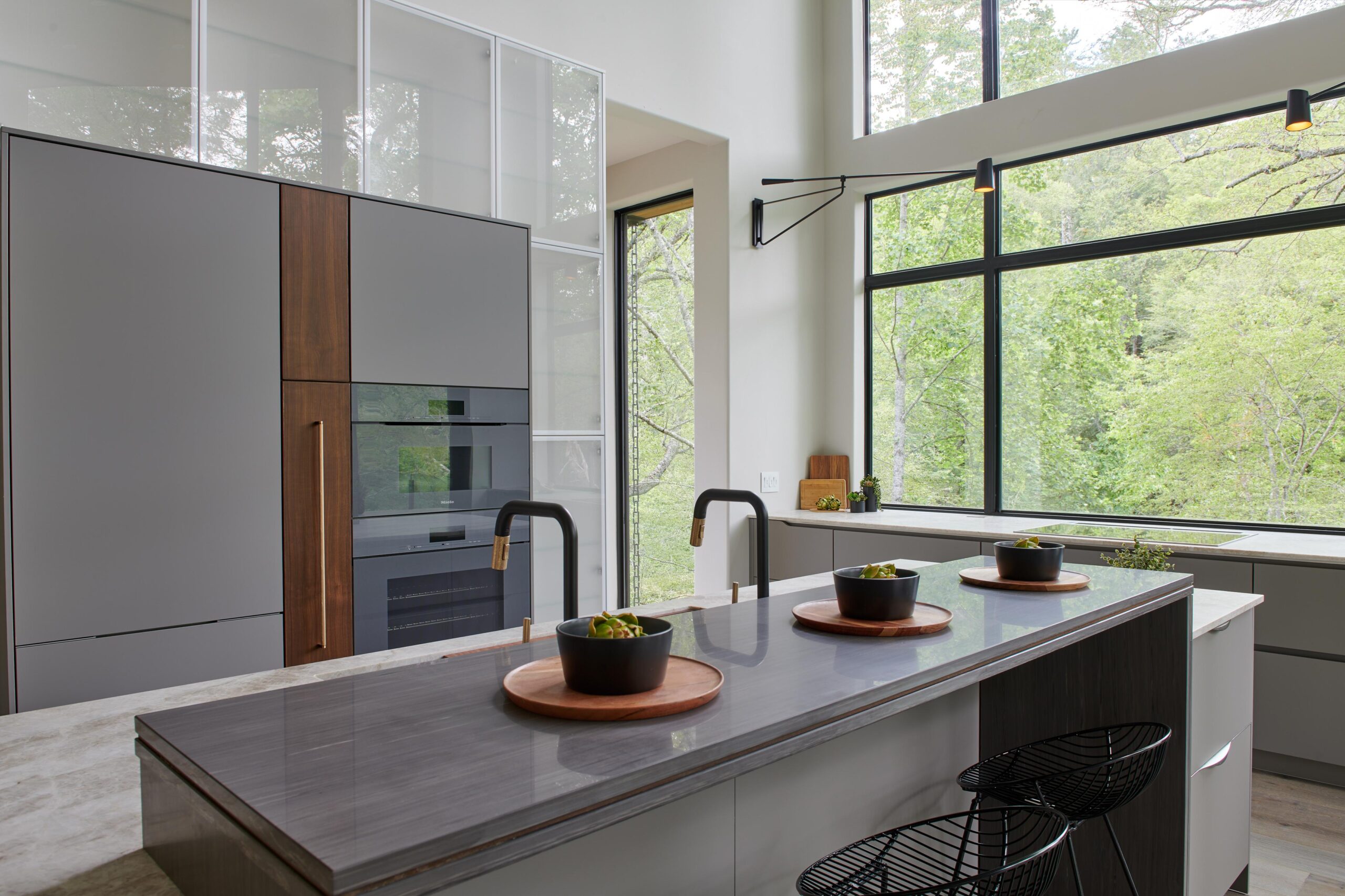 a_kitchen_with_a_large_window_brdb_highlands_nc_kitchen-living_room_natural_light