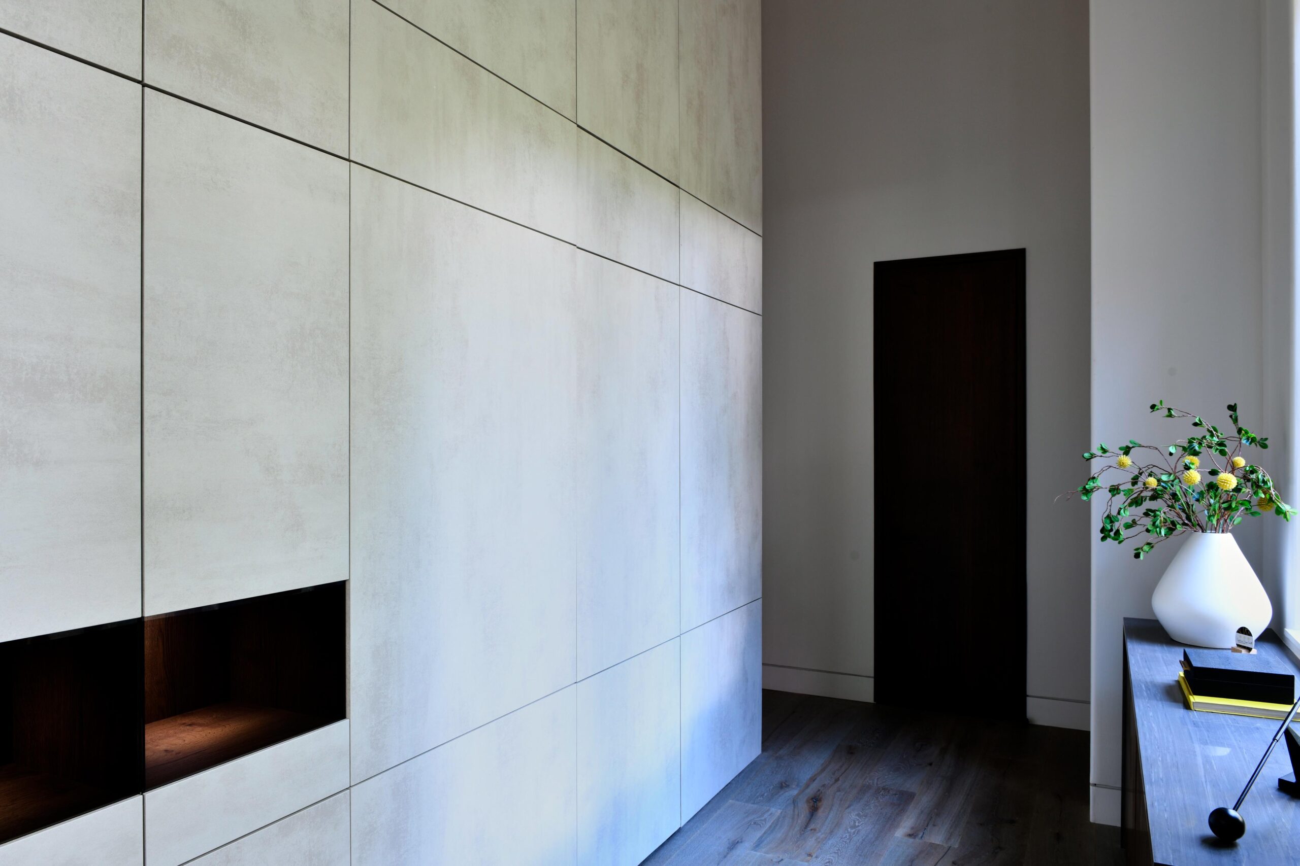 a_vase_of_flowers_sits_on_a_table_brdb_highlands_nc_architectural_details